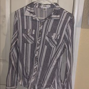 A white and black stripped blouse